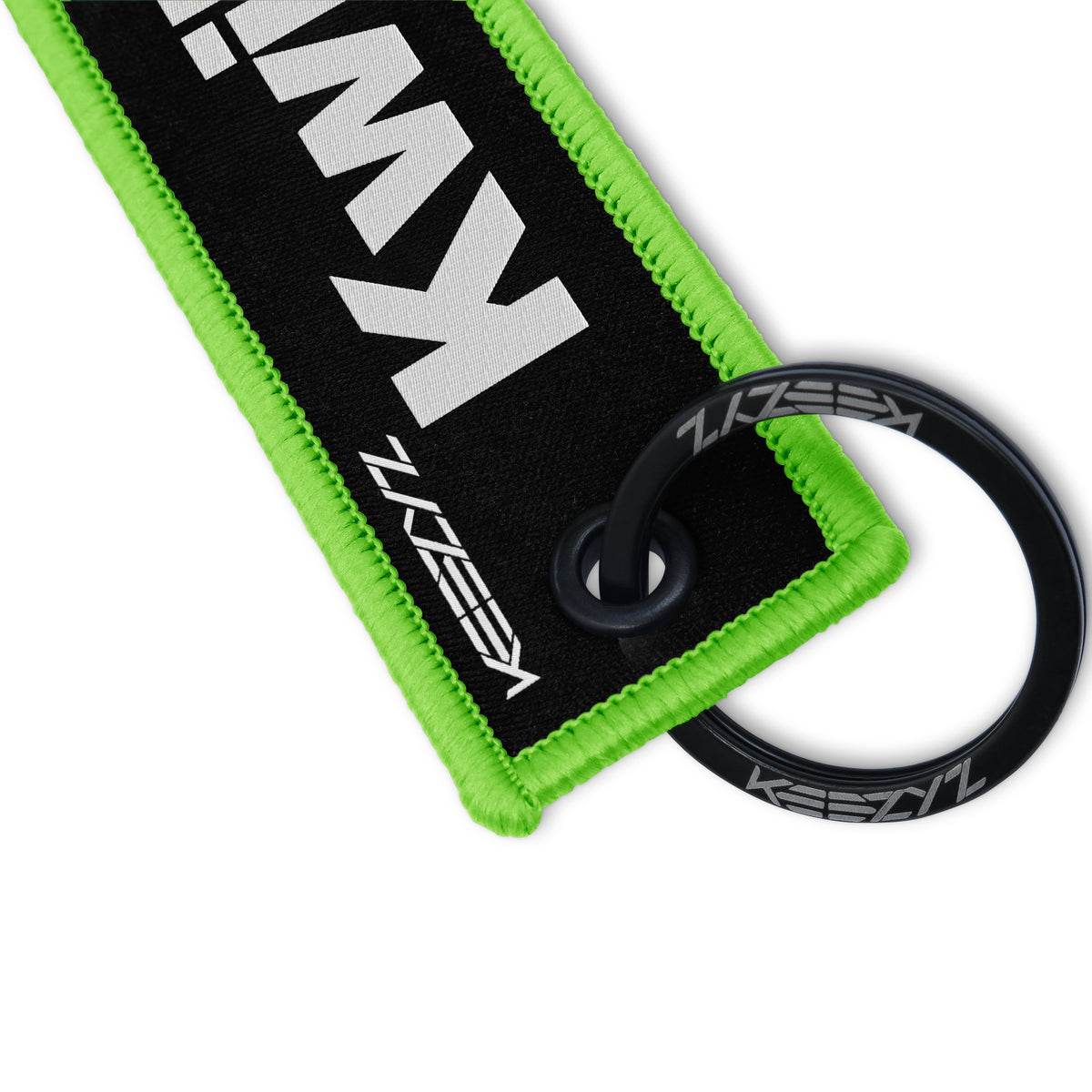 Close-up of the Keezyz Kwikasfuki keychain with Green border