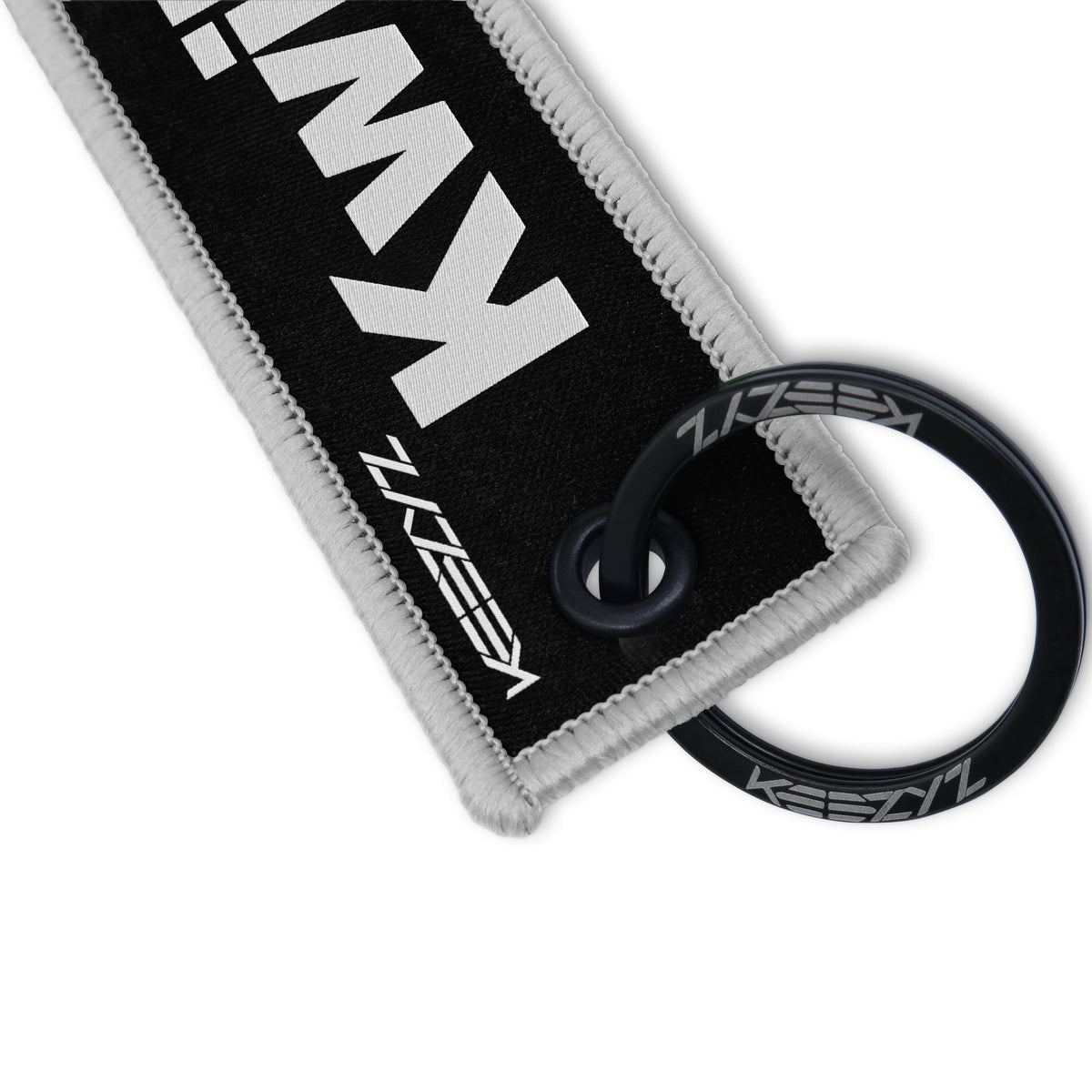 Close-up of the Keezyz Kwikasfuki keychain with Gray border