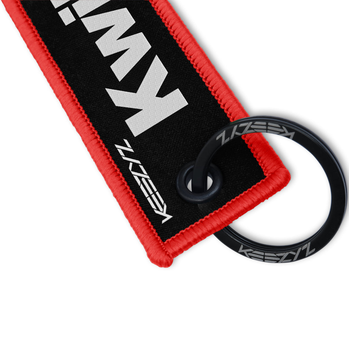 Close-up of the Keezyz Kwikasfuki keychain with Red border
