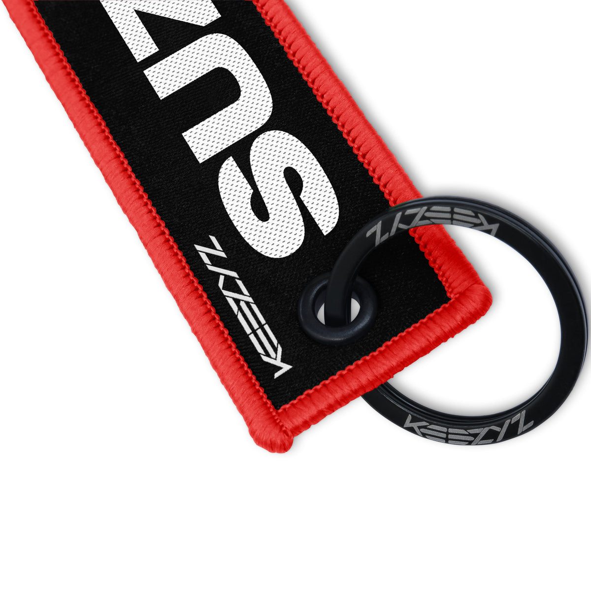 Close-up of the Keezyz Suzukey keychain with Red border