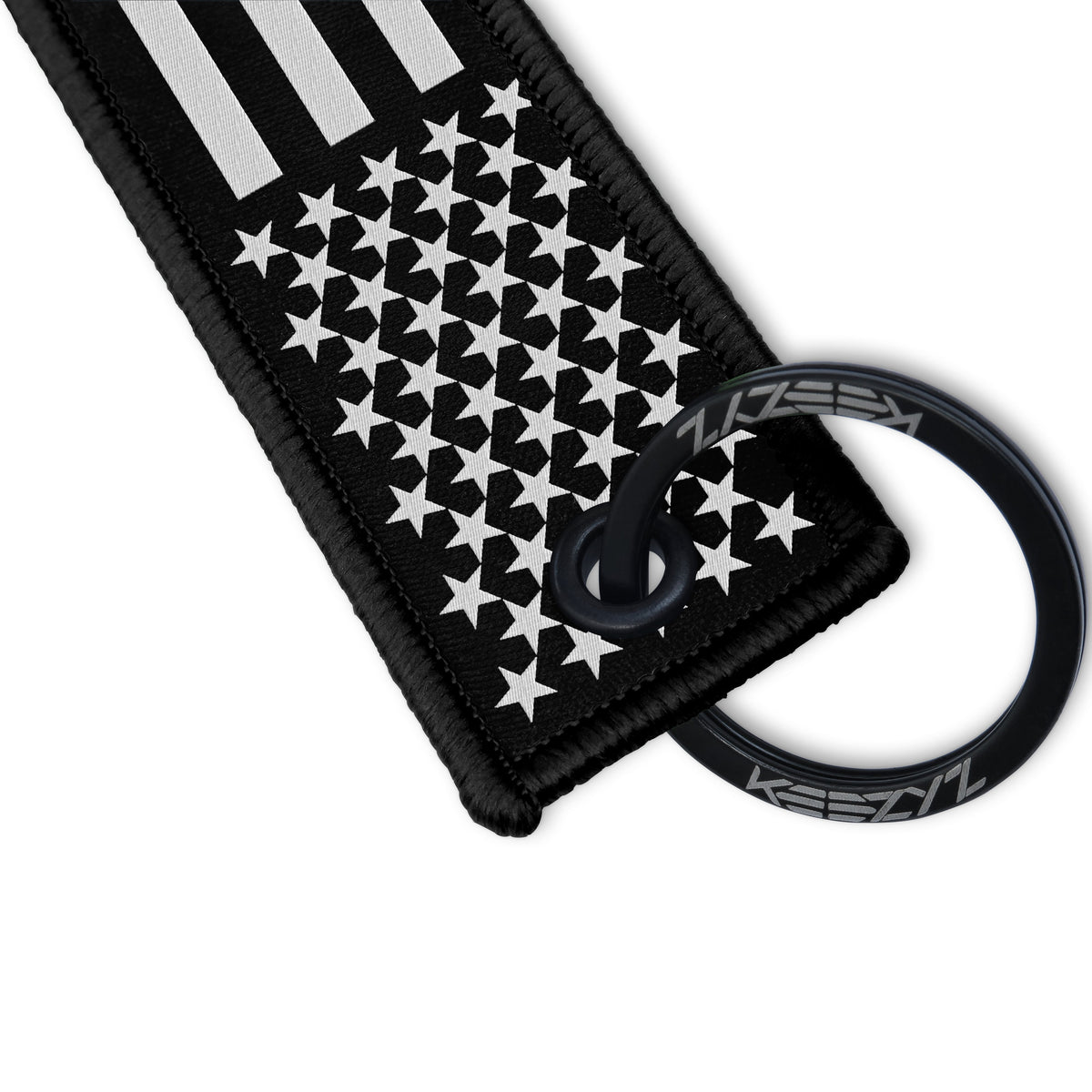 Close-up of the Keezyz US Flag Blackout keychain with Black border
