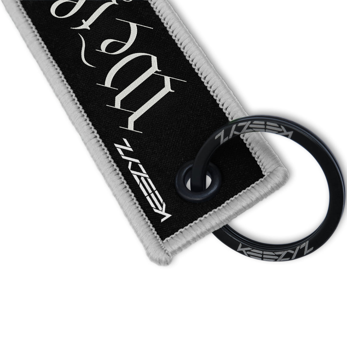 Close-up of the Keezyz We the People keychain with Gray border