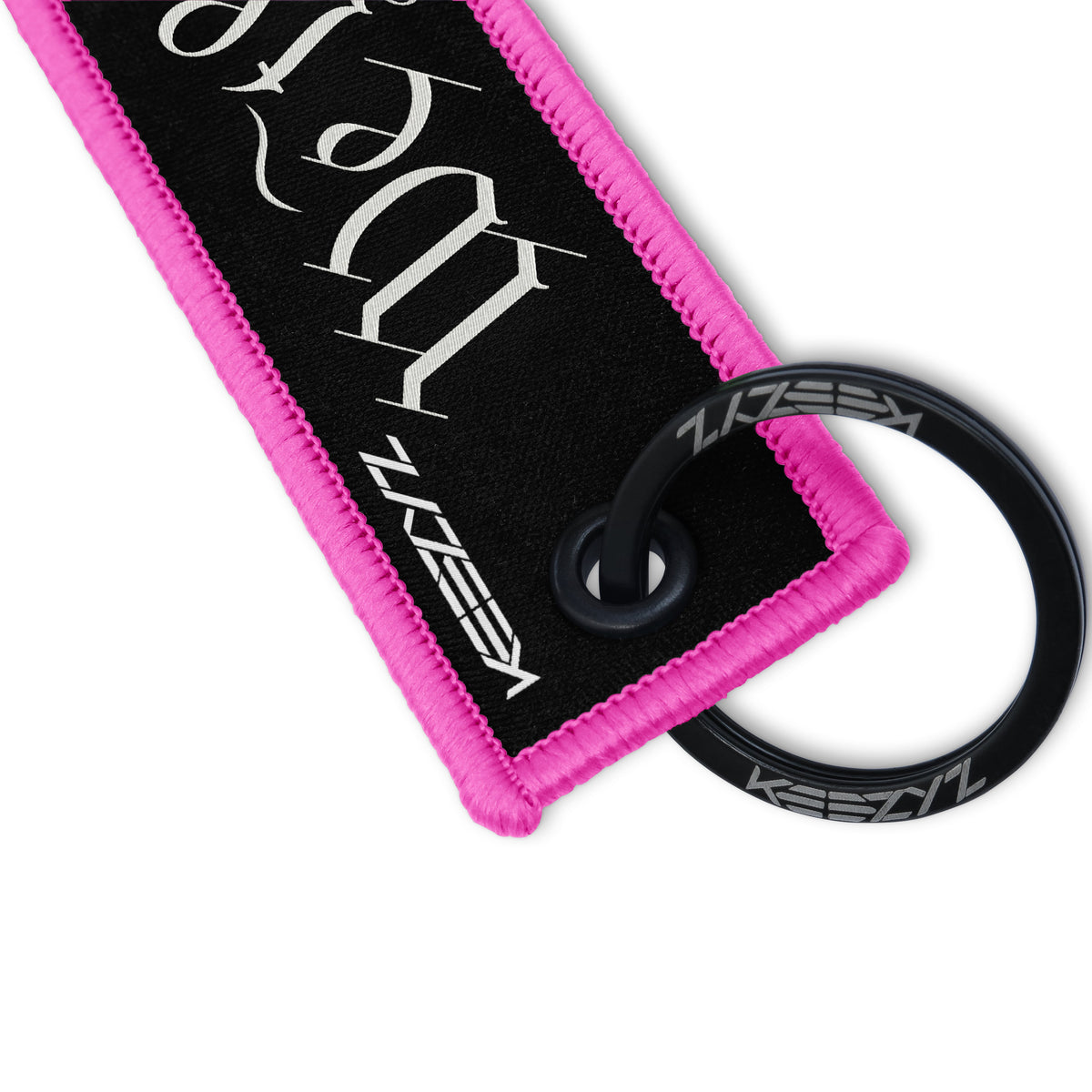 Close-up of the Keezyz We the People keychain with Pink border