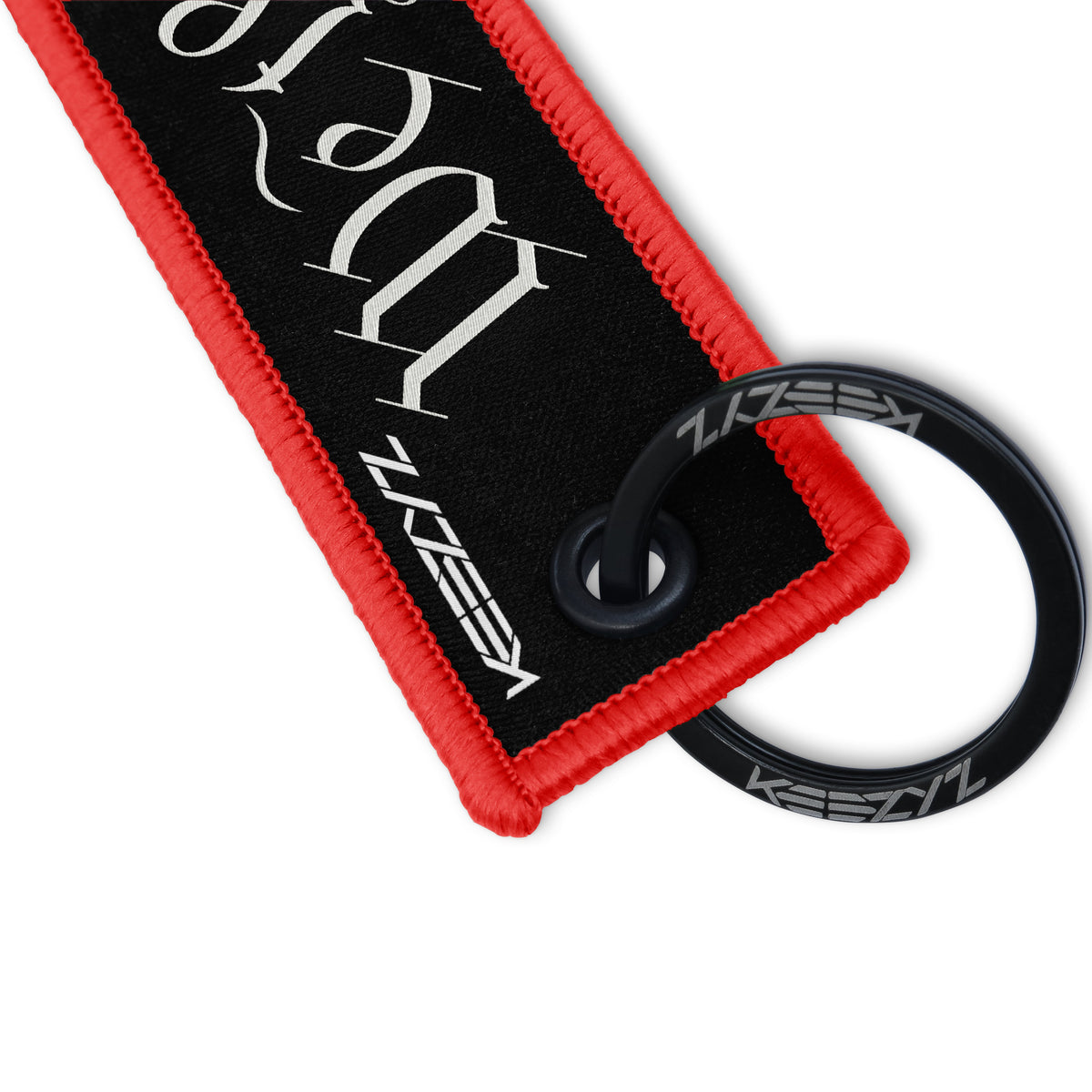 Close-up of the Keezyz We the People keychain with Red border